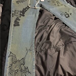 Off-White Light Blue Denim Jeans with Black Graphics